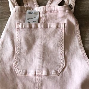 Light pastel pink overalls